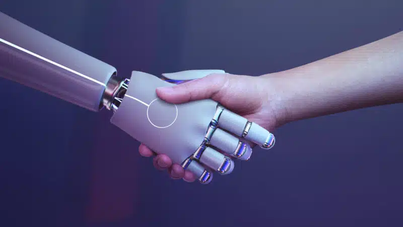 Robot handshake human background, futuristic digital age <a href="https://www.freepik.com/free-photo/robot-handshake-human-background-futuristic-digital-age_17850426.htm">Image by rawpixel.com on Freepik</a>